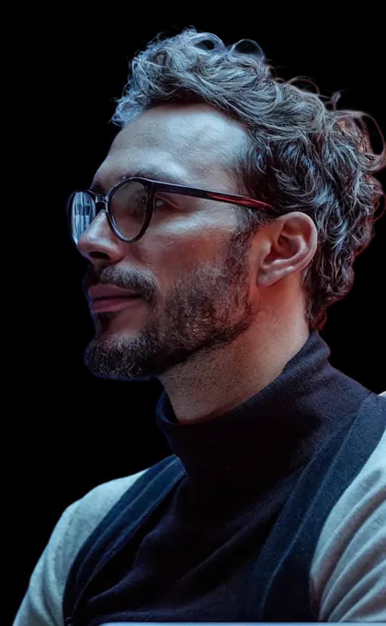 Contemplative man against vibrant background